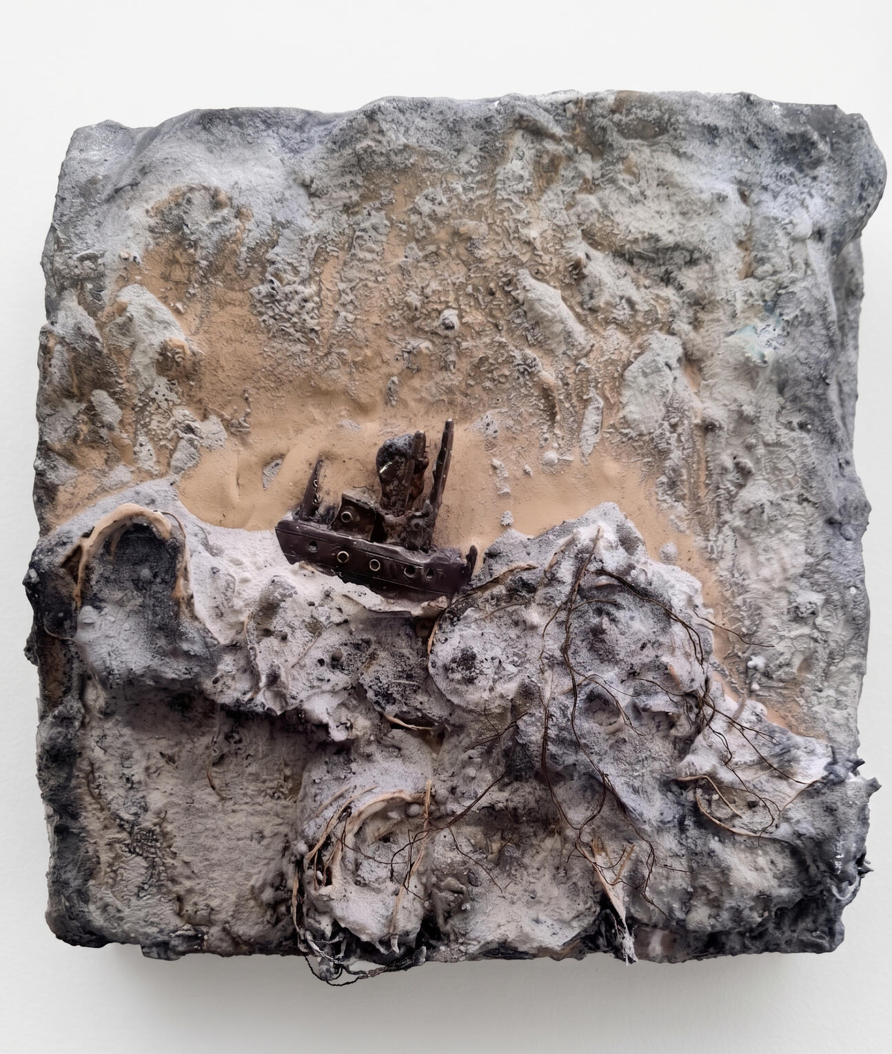 tin boat fighting a stormy sea of wire and plaster by Richard Elliott.